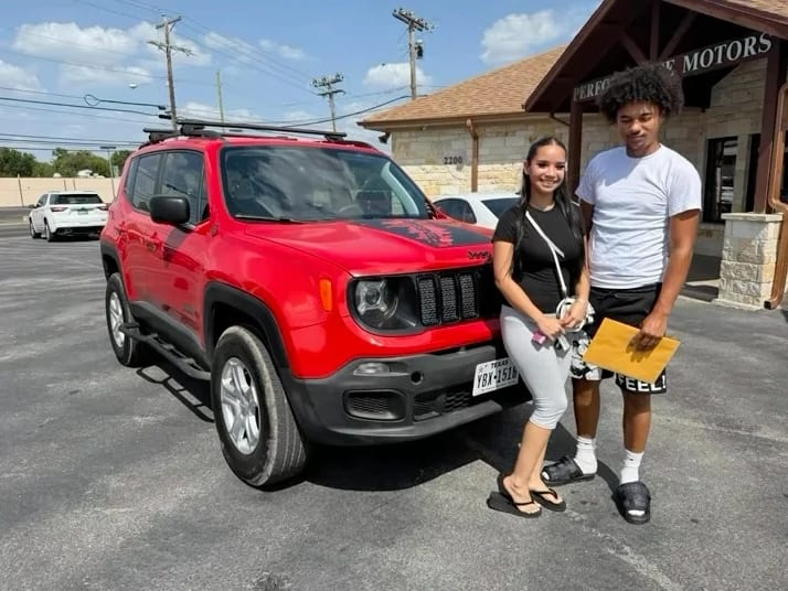 A Key Konnect customer with their new car on the lot in Killeen