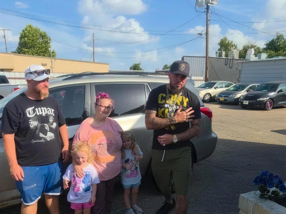 A Key Konnect customer with their new car on the lot in Killeen