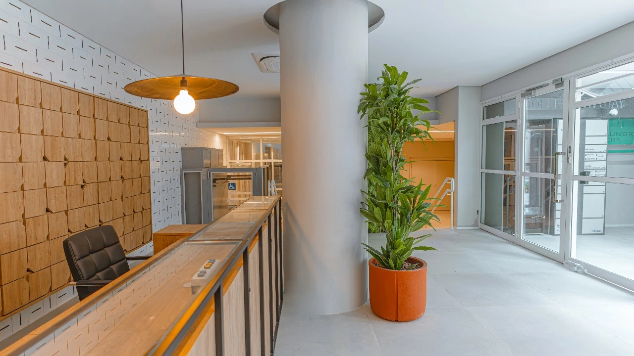 Sala e cozinha integradas do The Collection Paulista