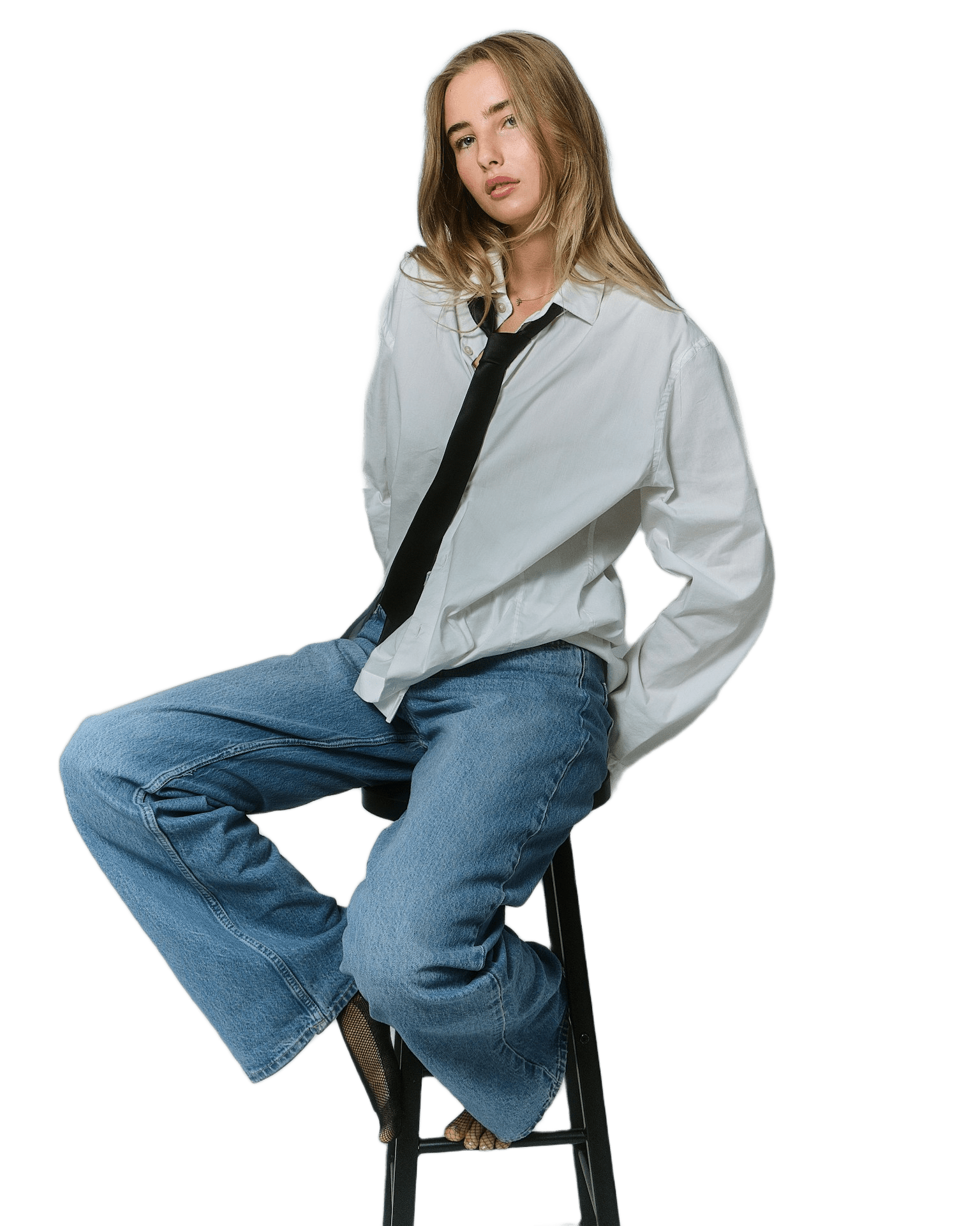 a girl sitting 