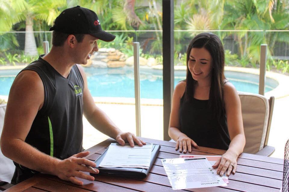 Blast pest signing documents with client