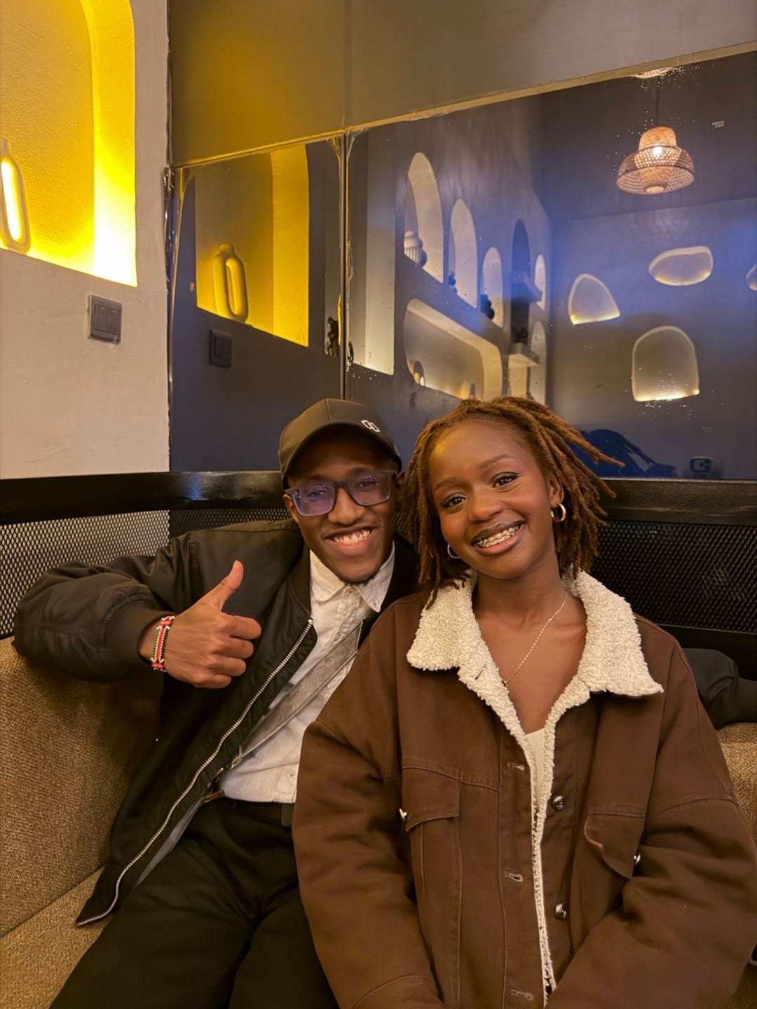 Dave and Emmy on the sofa at Artisan Blend Kilimani
