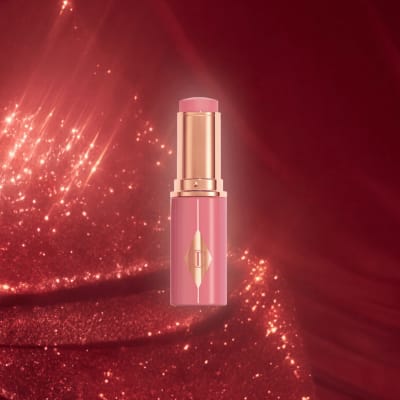 Charlotte Tilbury Unreal Blush Healthy Glow Stick in Rosy Glow, full size, from the 2026 advent calendar