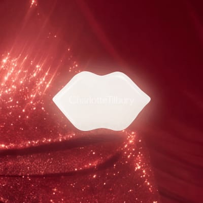 Charlotte Tilbury Magic Sculpting Gua Sha, pout-shaped, from the 2026 advent calendar