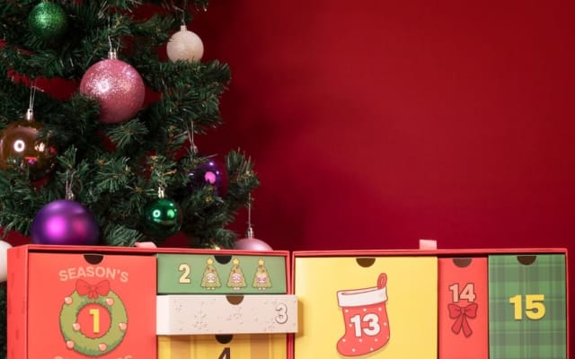 YesStyle Y So Cereal advent calendar 2026 top drawers 1, 2, 3, 13, 14 and 15 under a Christmas tree