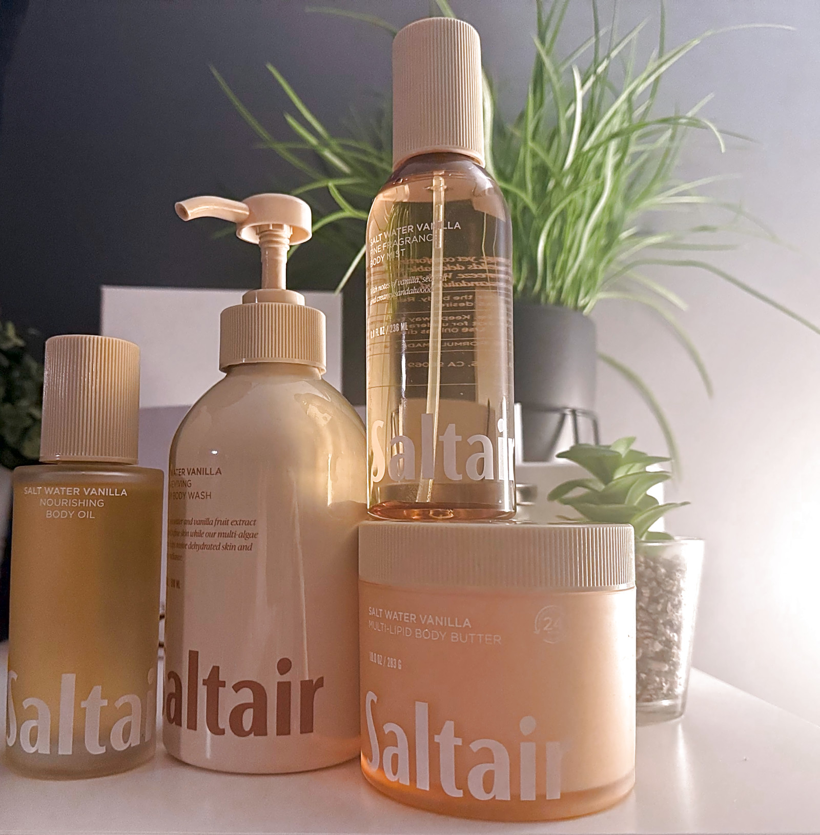 Saltair Salt Water Vanilla body oil, body wash, body mist and body butter on a shelf
