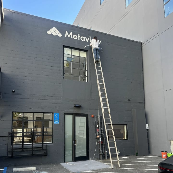 Metaview Exterior Logo Sign Installation Ladder, custom signage project in the San Francisco Bay Area.
