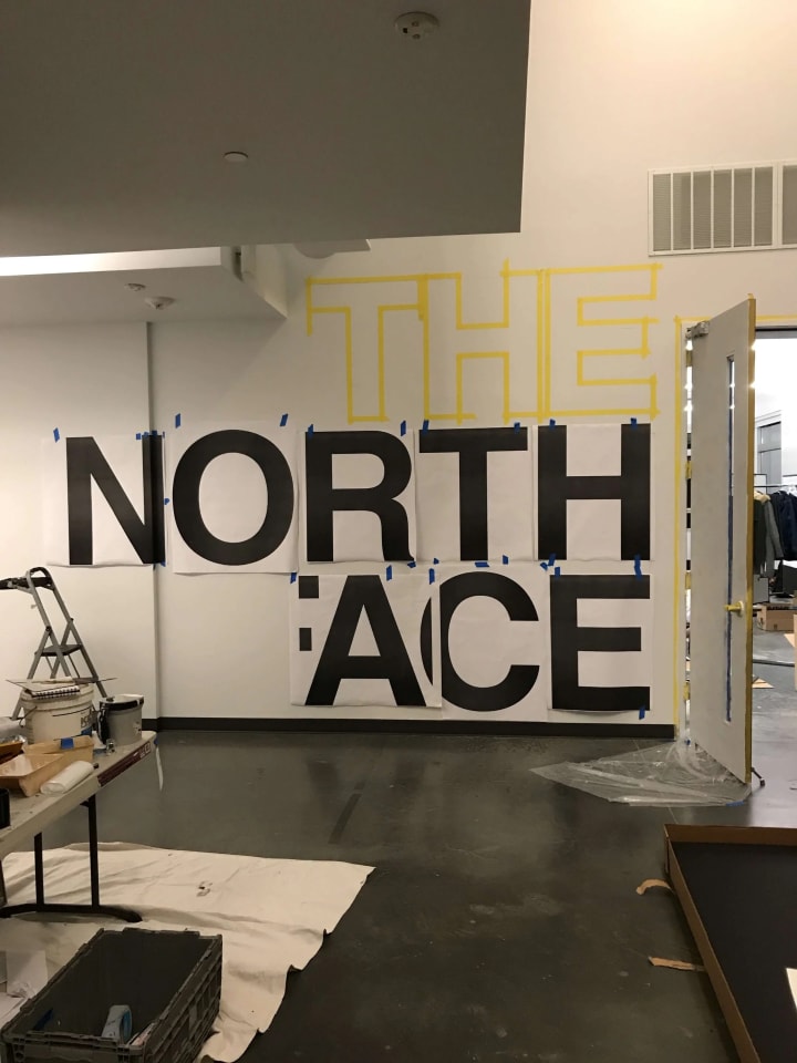 Alameda witnesses the North Face Design Headquarters enhancing its facade with a new sign installation, sho wcasing professional sign making finesse