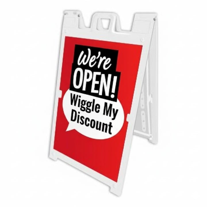 Concept image of a red We’re Open insert in a white A-frame