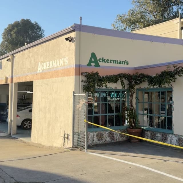 Ackerman’s painted lettering on a corner storefront in the Sacramento area