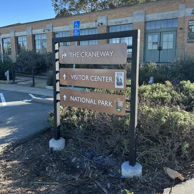 Directional sign pointing to The Craneway, Visitor Center and National Park in the Sacramento area