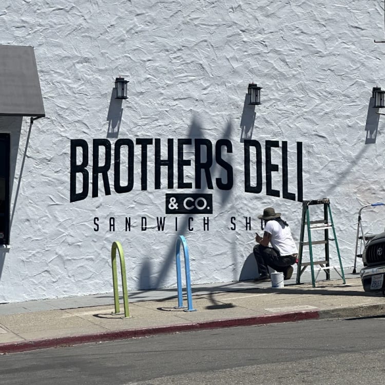 Brothers Deli Painted Wall Sign Mural Installation.