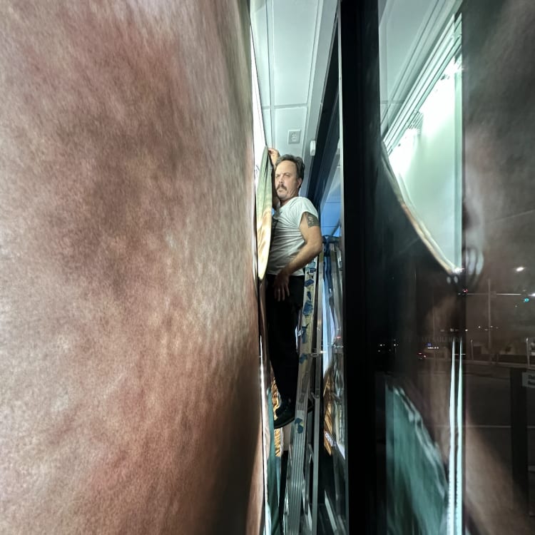 Large Format Wall Graphic Installation Ladder.