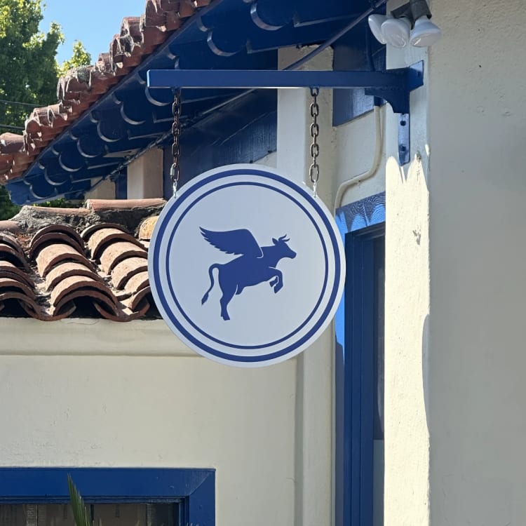 The Station Round Hanging Blade Sign.