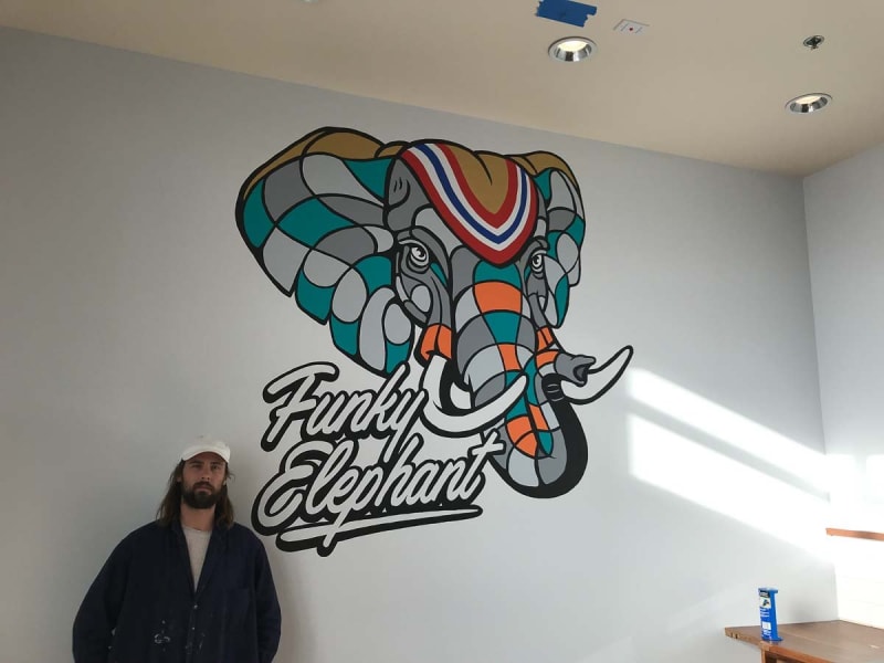 Colorful Funky Elephant restaurant mural in Berkeley
