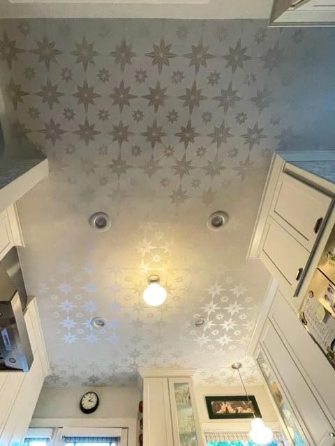 Custom painted kitchen stencil viewed from floor level