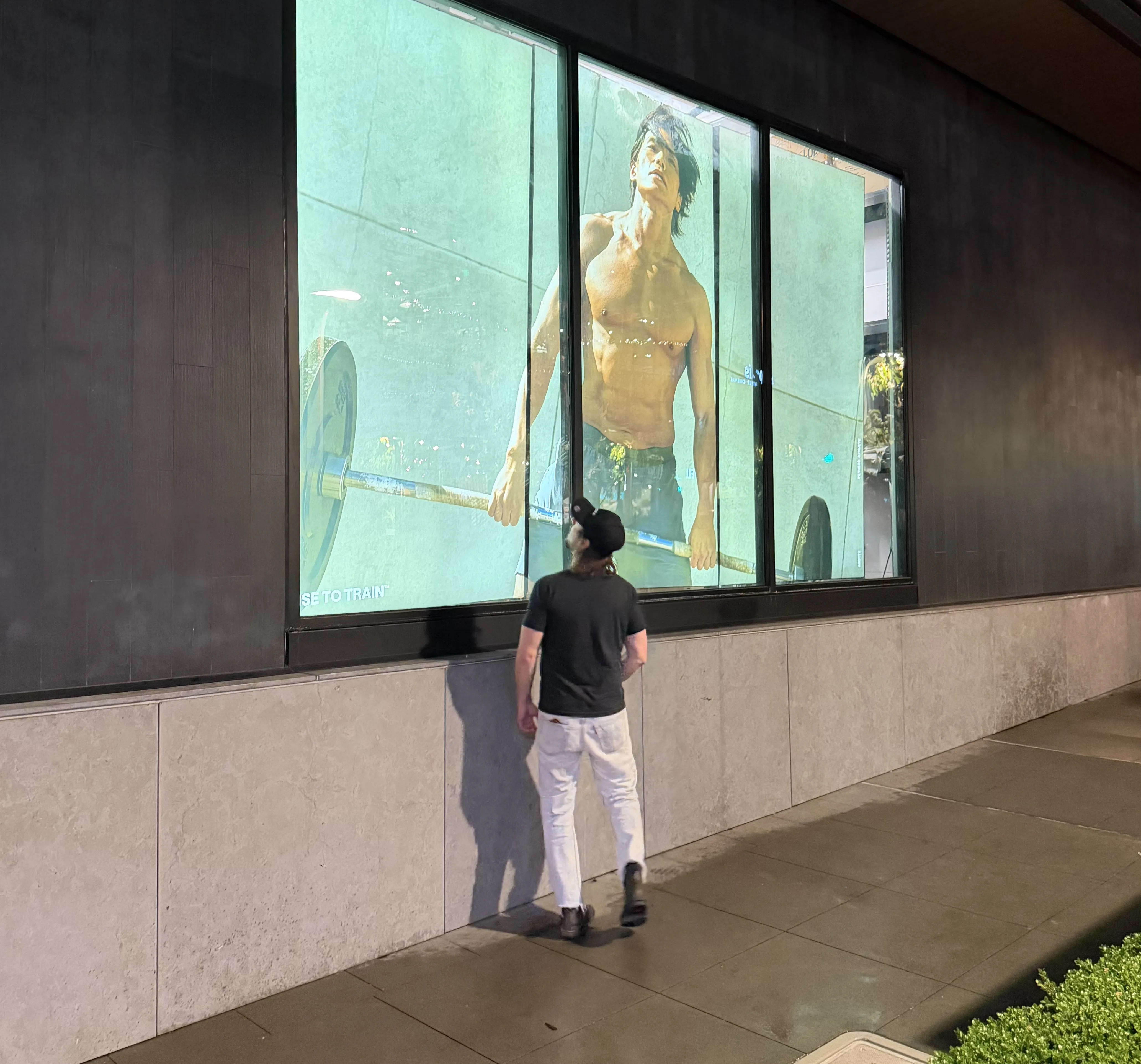 Close-up of a silicone edge graphics fabric panel during installation