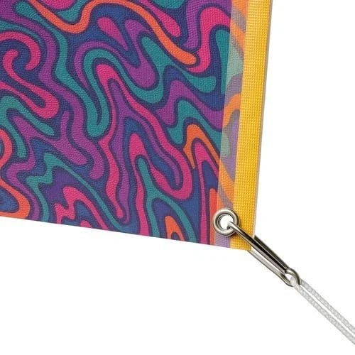 Close-up of printed vinyl banner material showing fabric texture and surface detail.