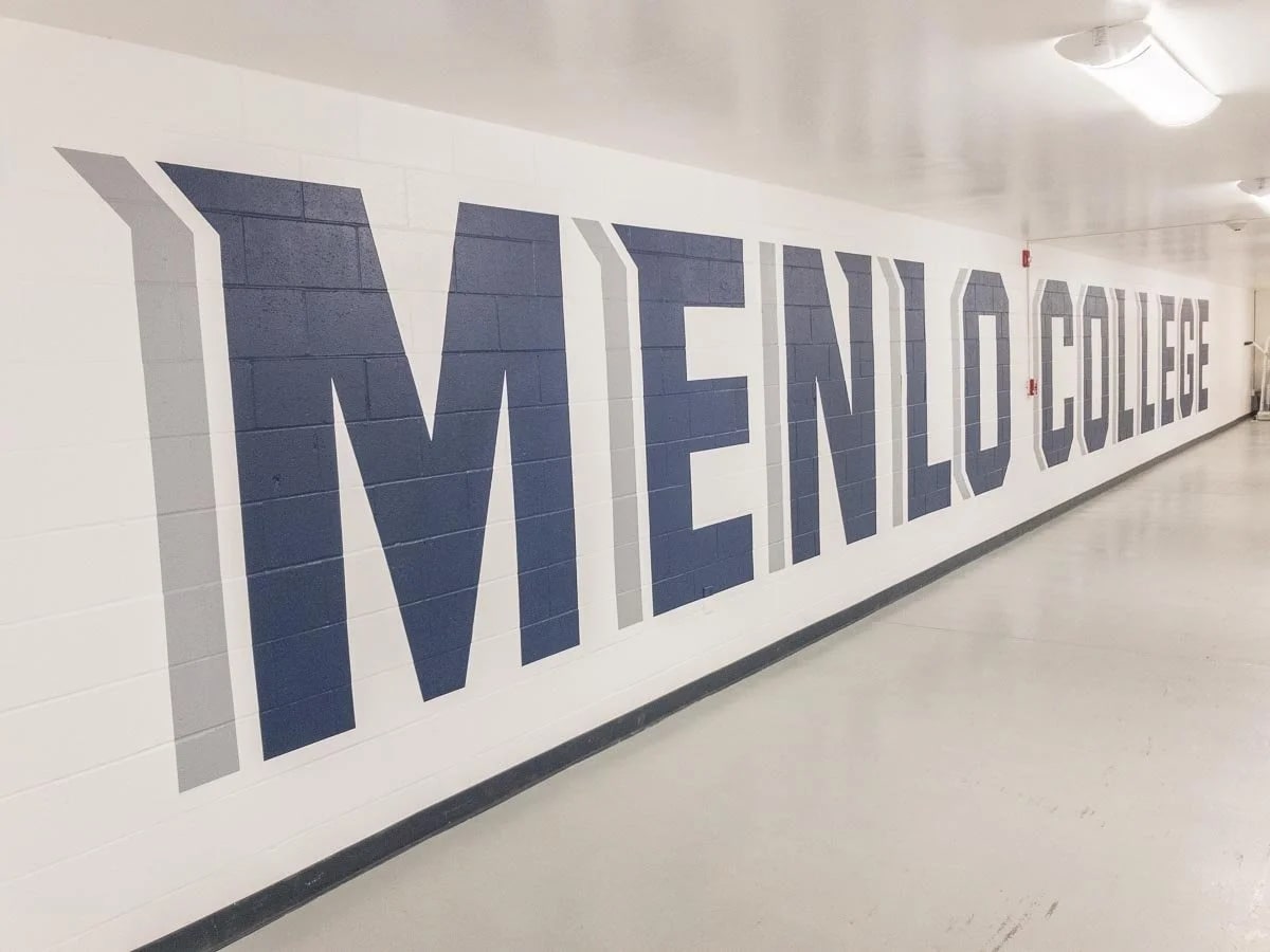 Large-format wall graphics installed in a commercial hallway