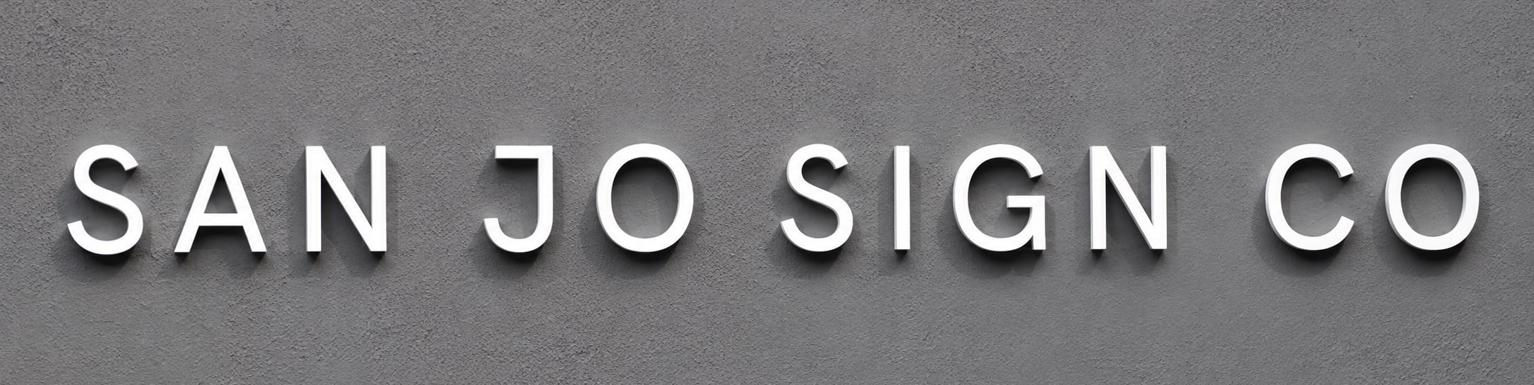 San Jo Sign Co dimensional letters mounted on a textured wall
