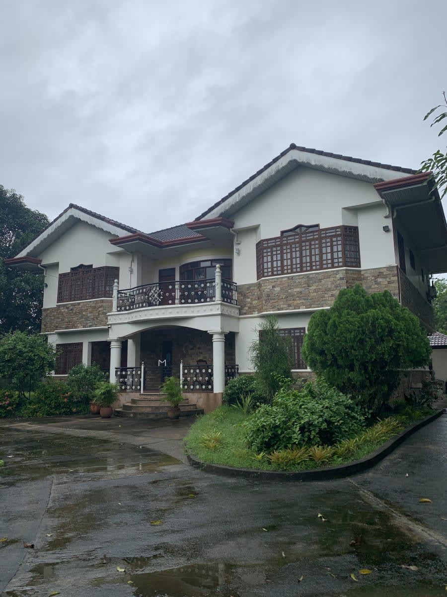 2-storey residential house on a 8,786 sq. meter orchard lot