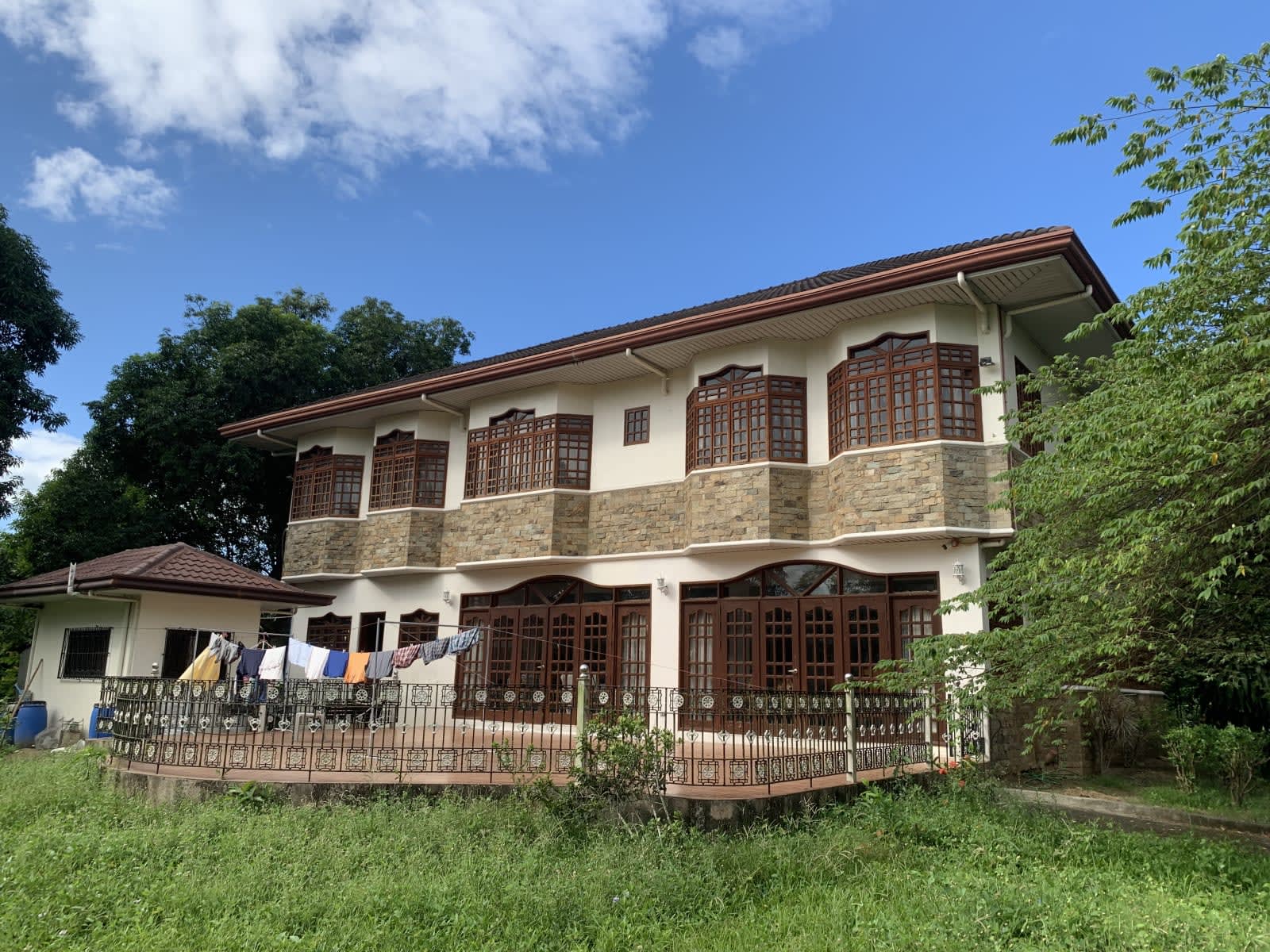 2-storey residential house on a 8,786 sq. meter orchard lot
