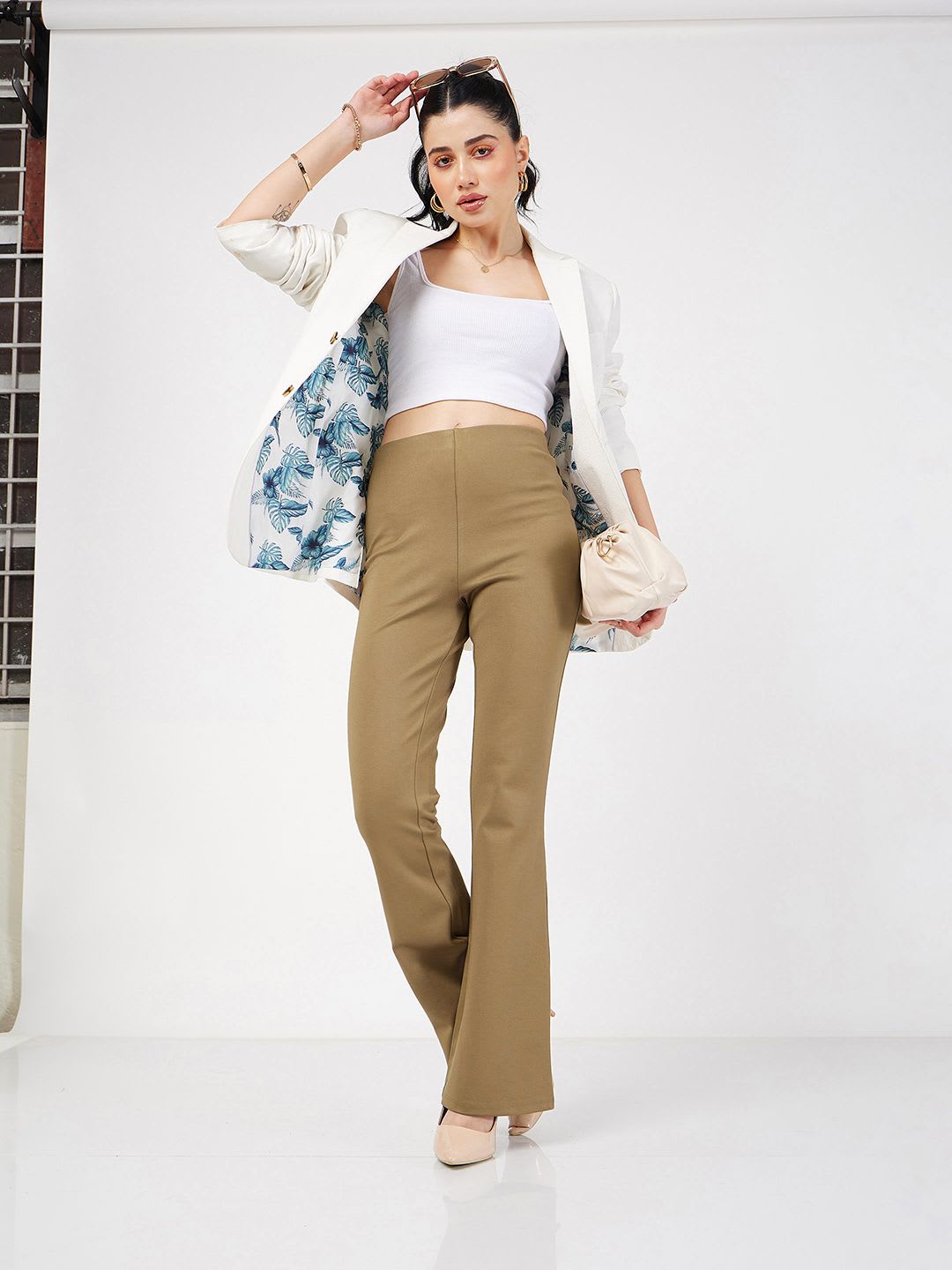 SASSAFRAS Women Beige Mid-Rise Slim Fit Bootcut Trousers - left view