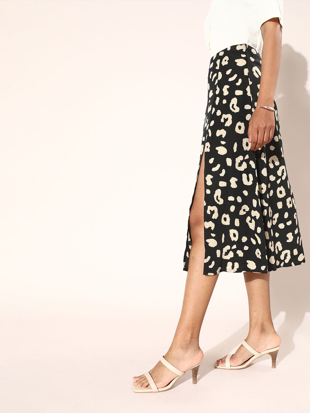 Berrylush Women Black Abstract Animal Printed Skirt - back view