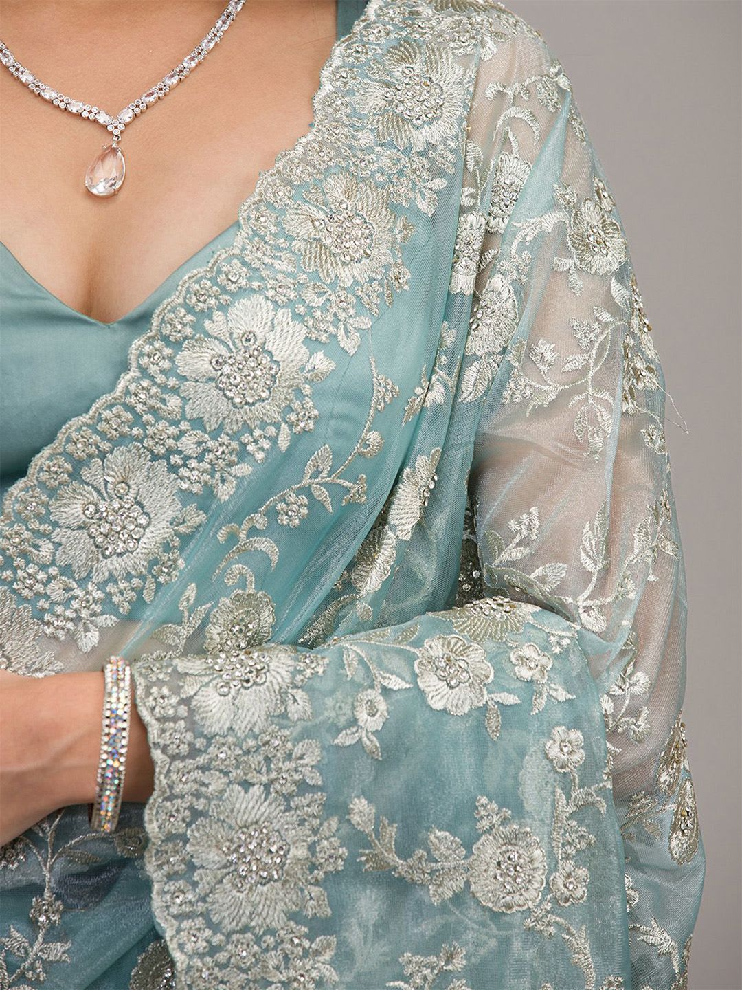 Koskii Women Zariwork Turquoise Blue Tissue Saree With Unstitched Blouse - left view