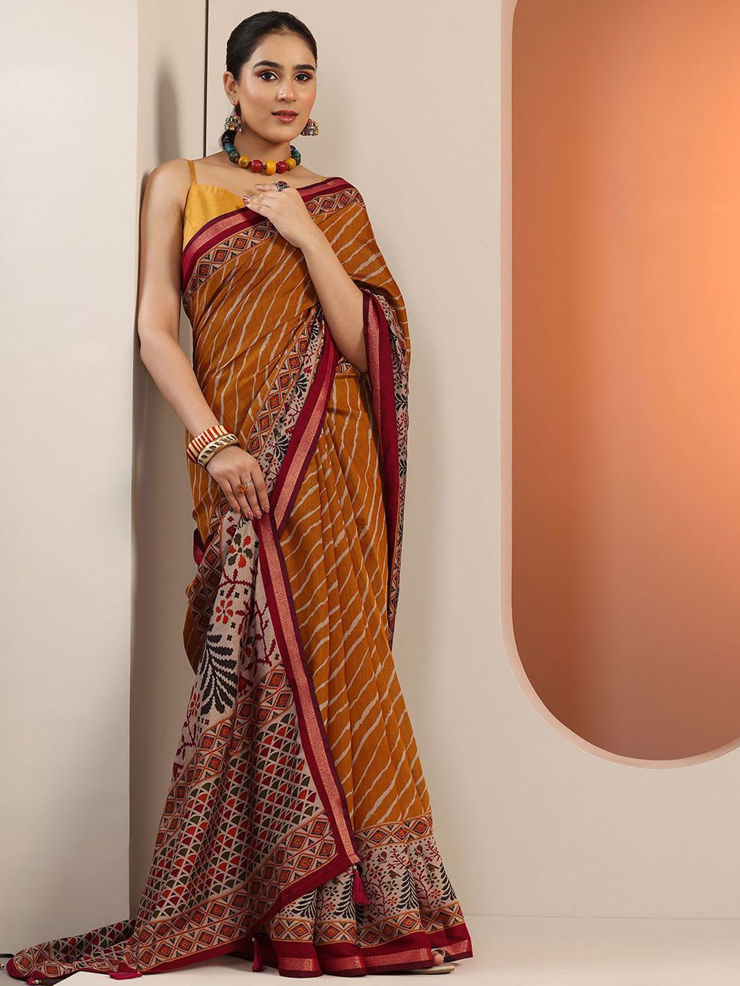 Libas Mustard Leheriya Printed Cotton Blend Saree With Unstitched Blouse Piece - left view
