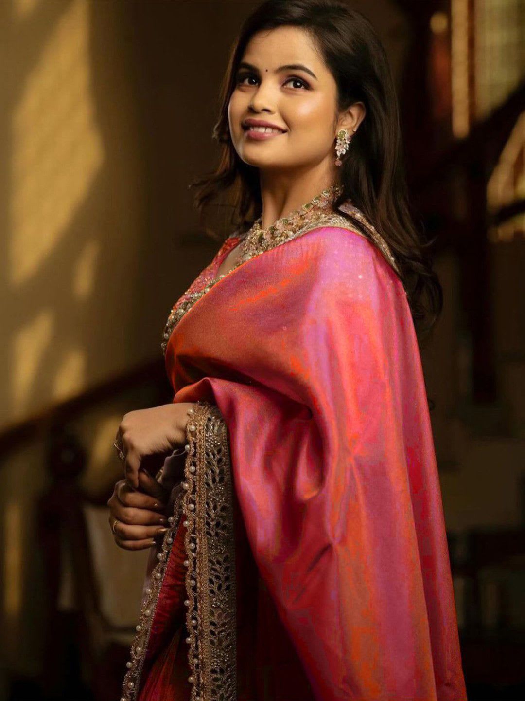 Anouk Solid Embellished Mirror Work Tissue Celebrity Saree - back view