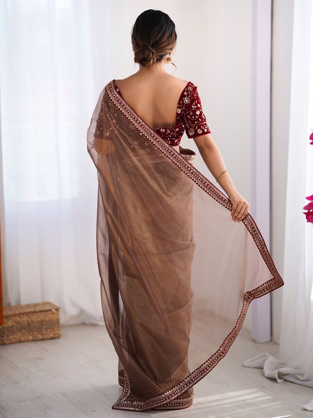 Saree mall Brown Embellished Net Saree with Embroidered Border - back view