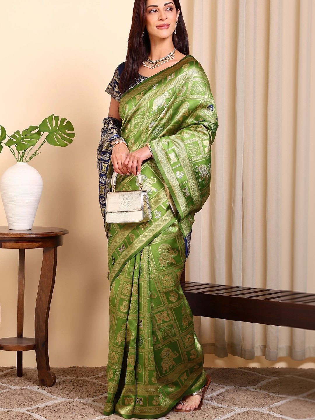 CAARAA Woven Design Zari Art Silk Saree - back view