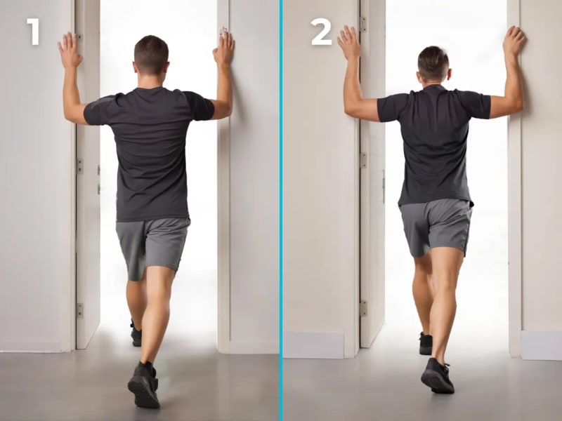Chest opener doorway stretch exercise demonstrating proper form for reversing phone-forward shoulder rounding
