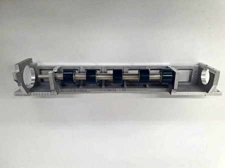 Printer feeder - precision machined component