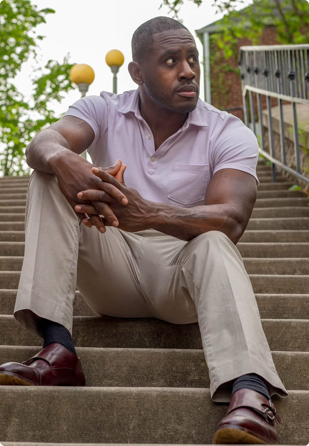 Ed Latimore sitting on stone steps