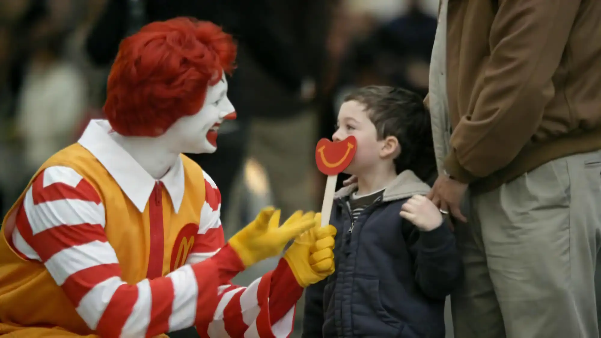 Ronald McDonald in a 1980s McDonald’s TV commercial with smiling children