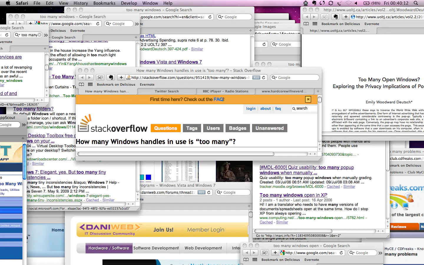 Cluttered desktop with dozens of overlapping windows, demonstrating cognitive overload and fragmented digital workflows.