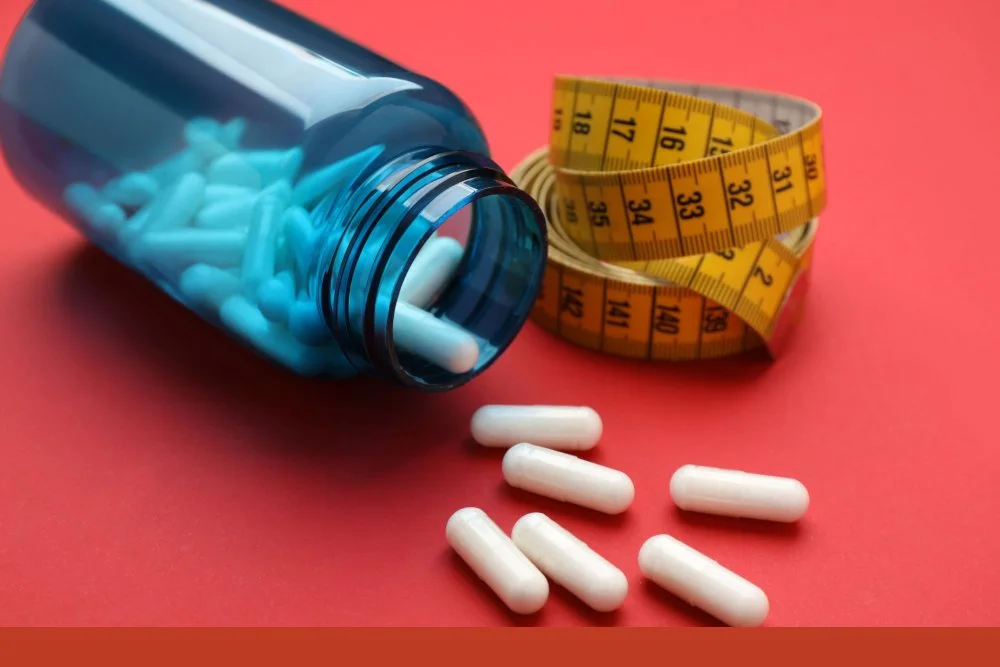 Photo of a pill bottle with measuring tape, depicting the reality of obesity.