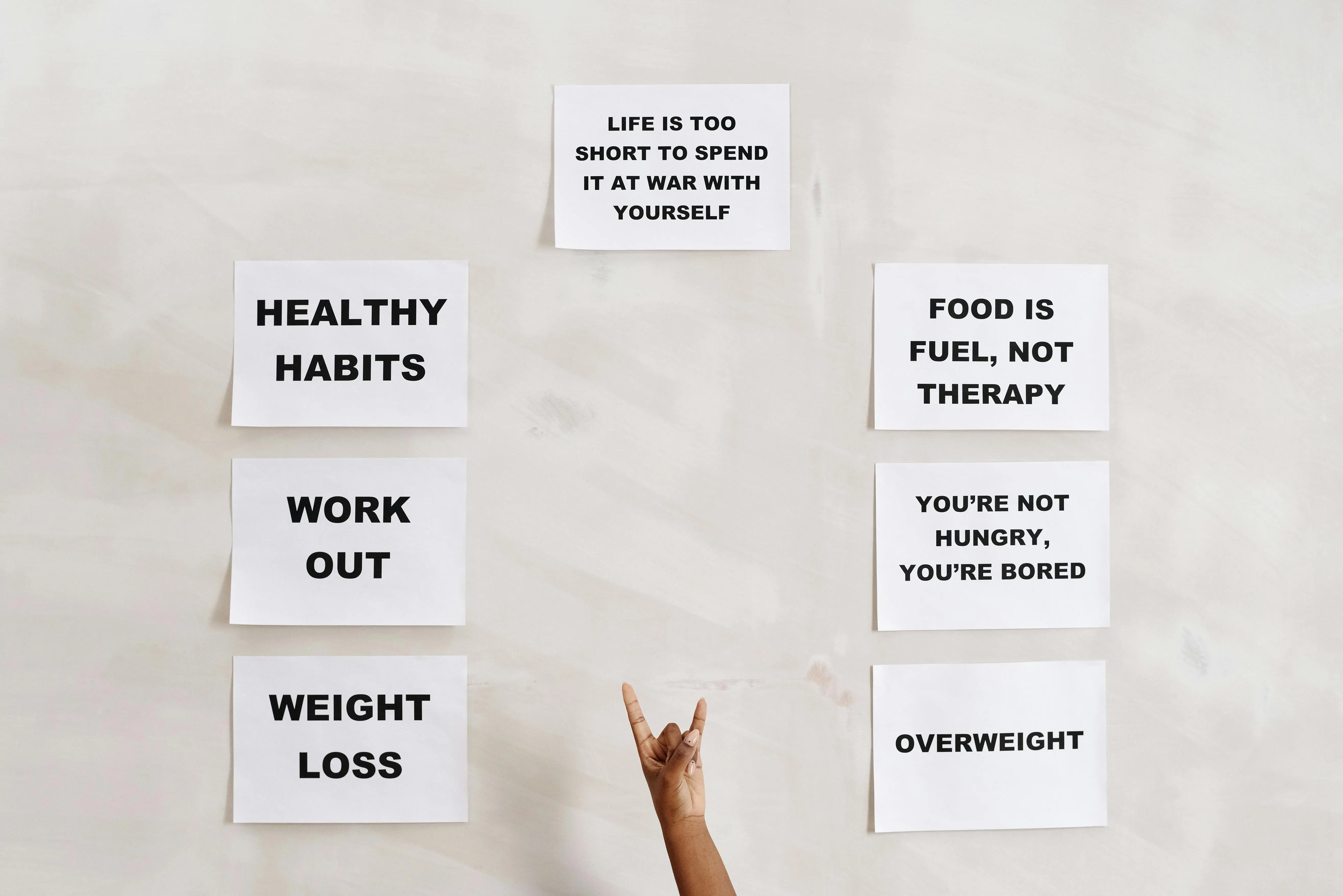 the weight of social pressure and stigma faced by people living with obesity