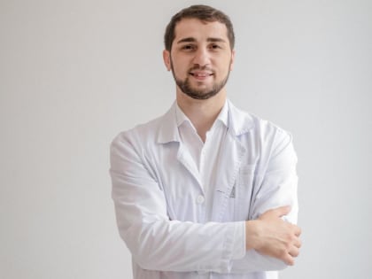 Почему болит спина