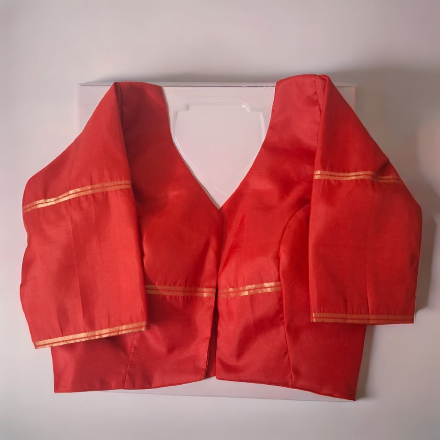 Red designer saree blouse with hand embroidery, stitched at Anagha Creation, Kolhapur