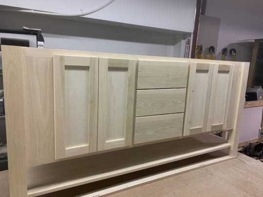 Front view of custom wooden bathroom vanity.