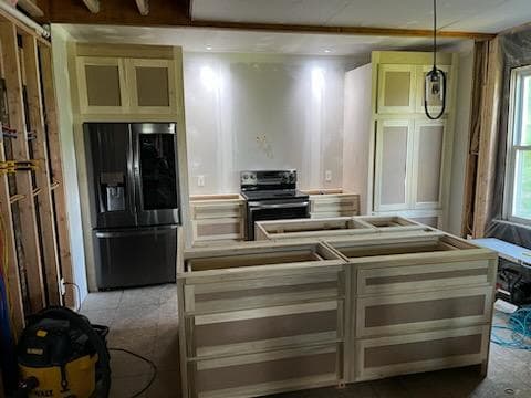 View of installed custom kitchen cabinets.