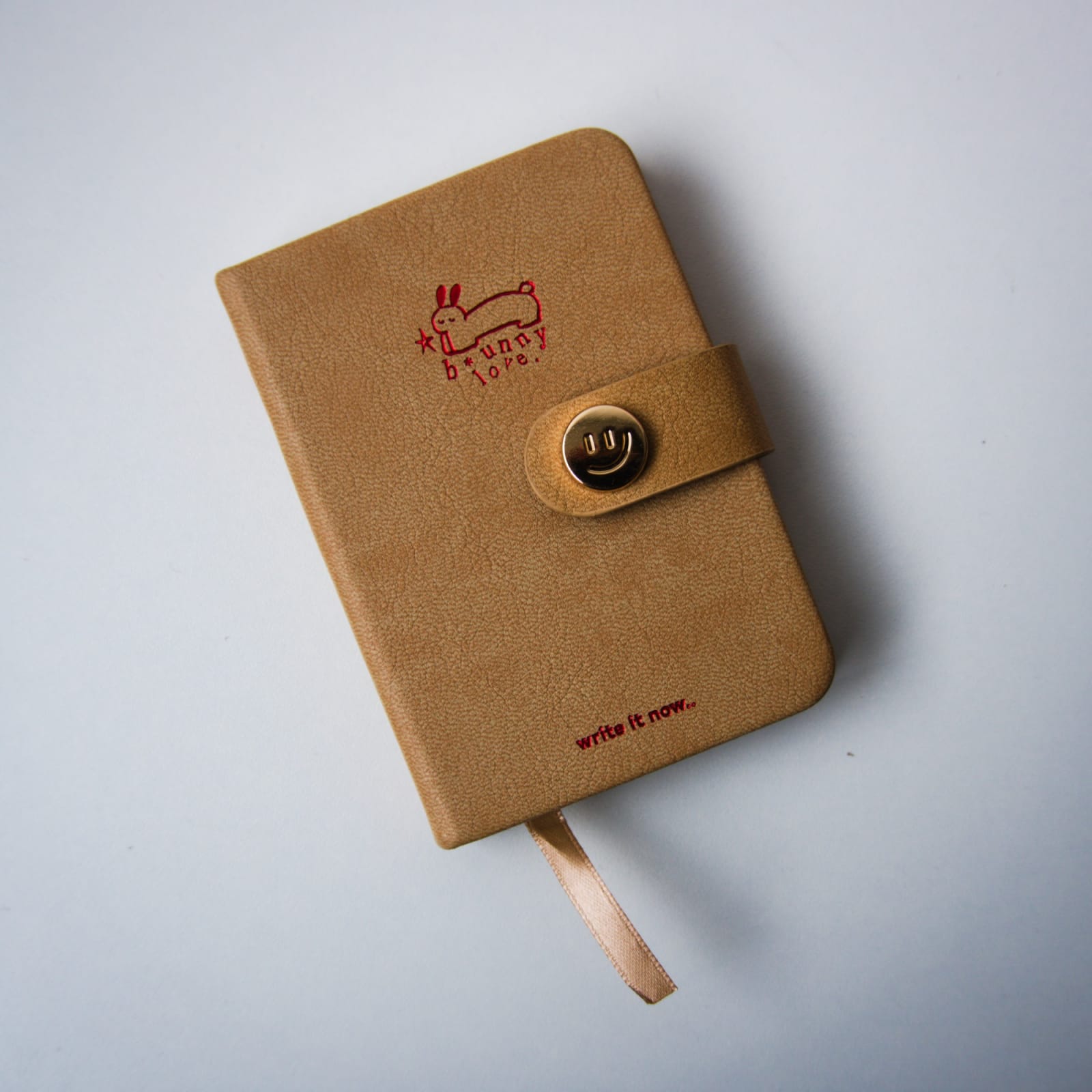 Mini agenda botón tierra