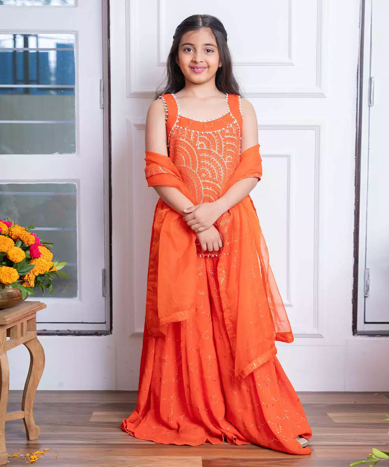 Kids’ Bright Orange Peplum Kurti Set with Floral Embroidery