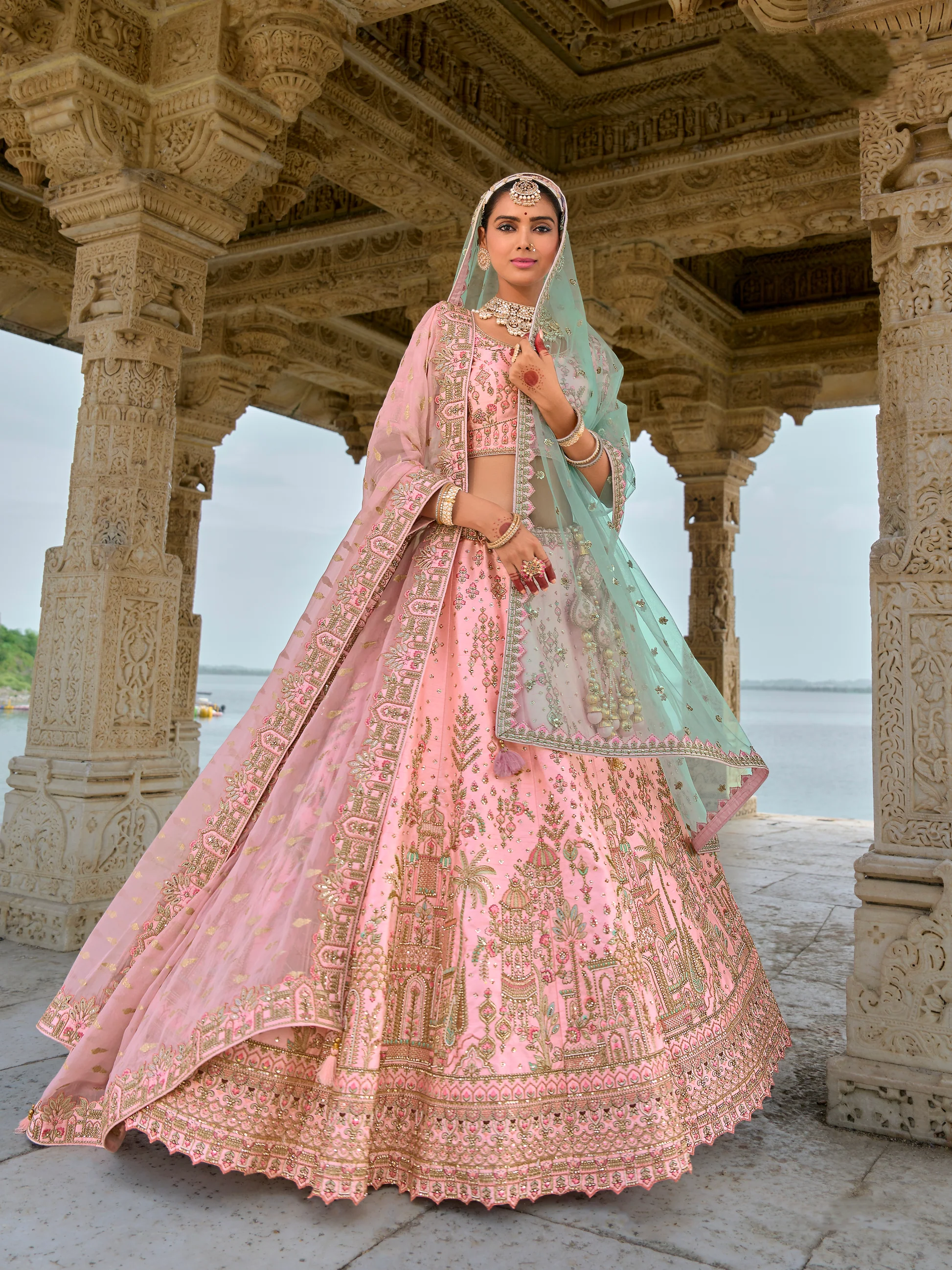 Bridal Champagne Pink Heavy Embroidered Net Lehenga