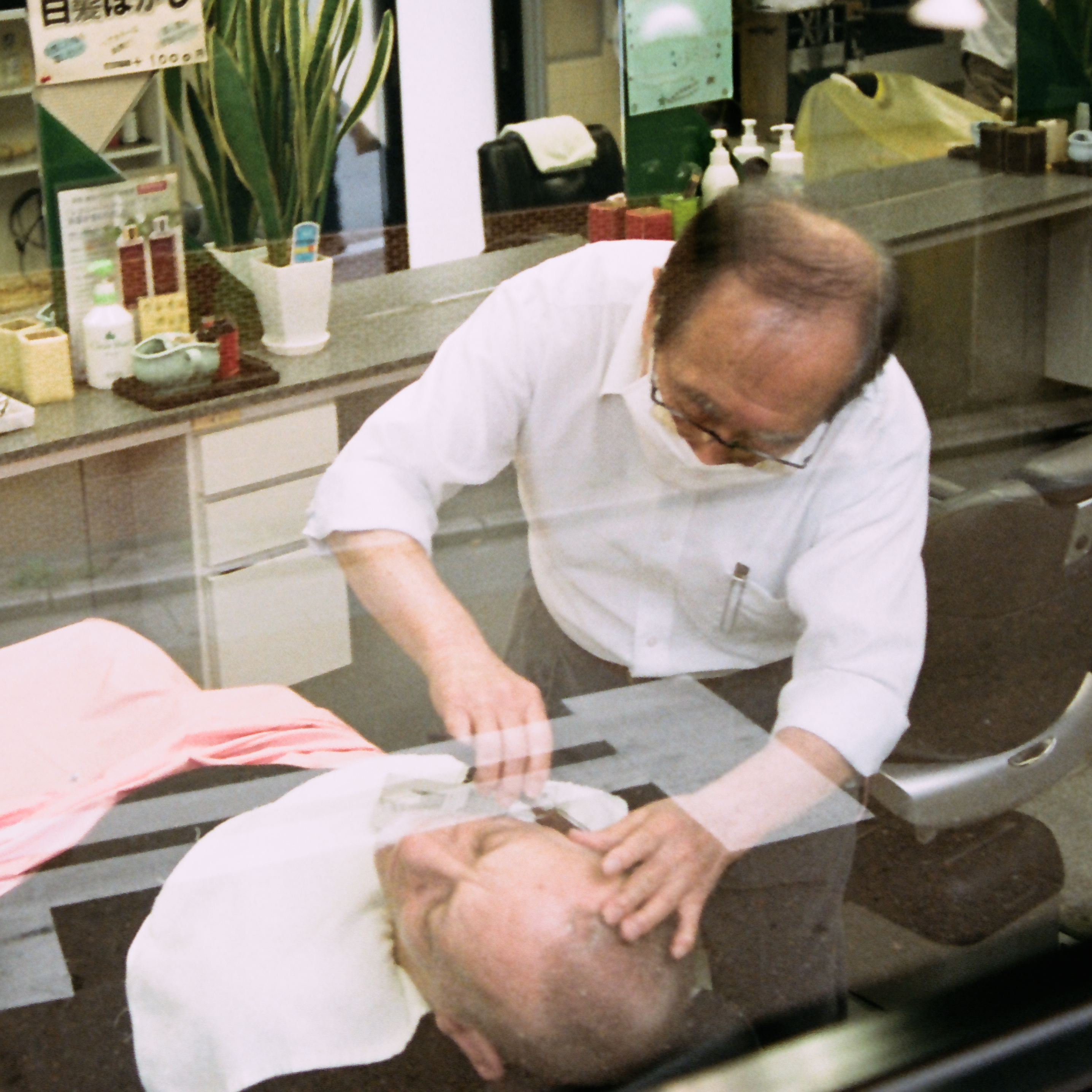 Barber Shaving Man's face