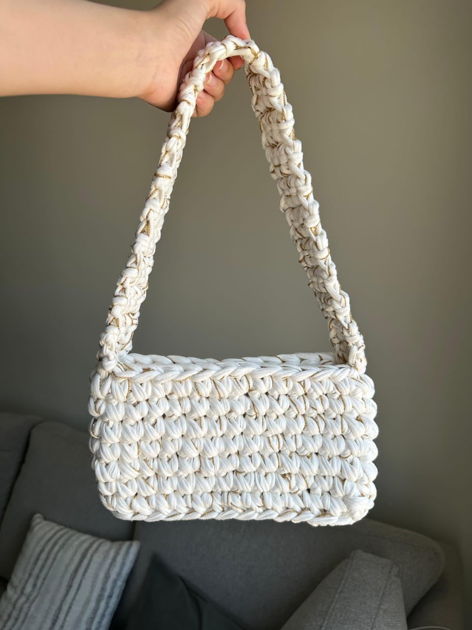 white and gold bag