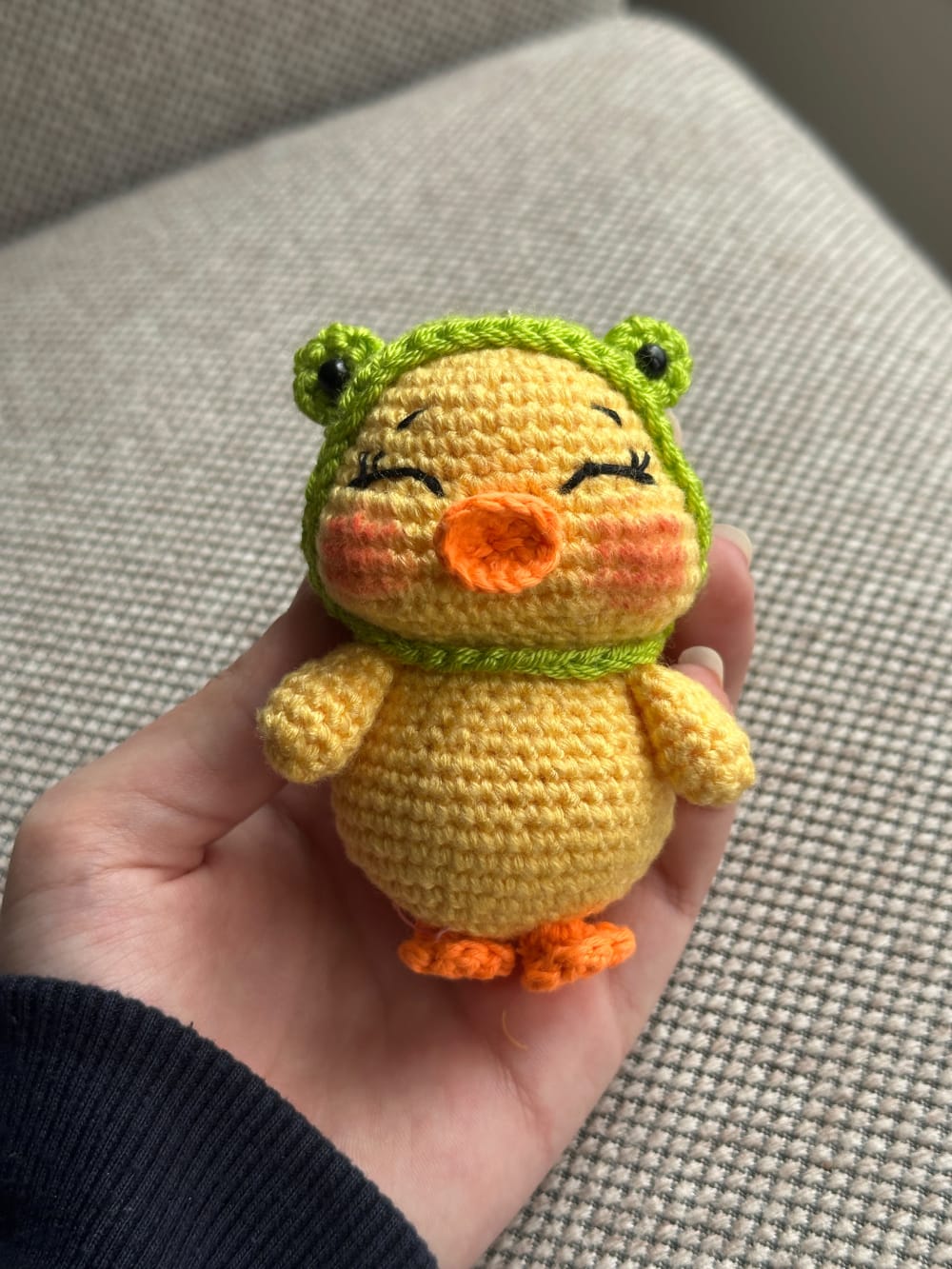 Duck charm with frog hat